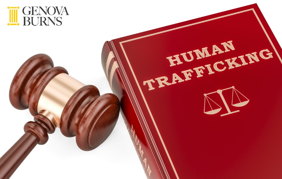  human trafficking concept with gavel and book